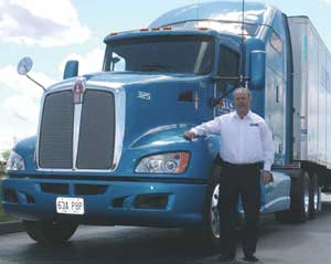 Kenworth's T660, like this one selected by Mike Walker, president of TCSI-Transland, can be supplied with all SmartWay tractor specs.